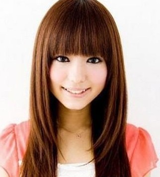 長臉女生優雅齊瀏海長卷髮型設計-美髮館